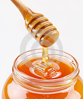 Honey dipper and full honey pot