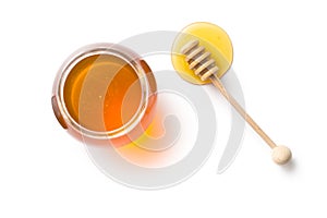 Honey dipper and honey in jar