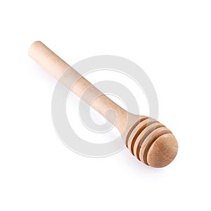 Honey dipper or spoon made from wooden isolated on white background
