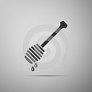 Honey dipper stick with dripping honey icon isolated on grey background. Honey ladle.