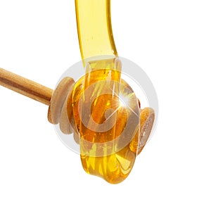 Honey drip from wooden dipper