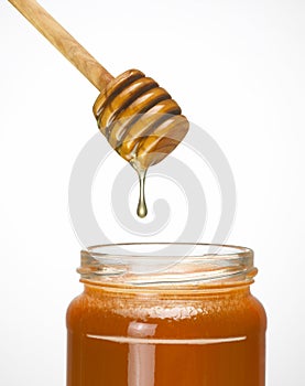 Honey dripper with jar photo