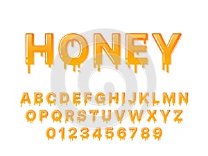 Honey font. Flowing syrup capital letters and numbers with droplets. Melting design alphabet. Sweet and stringy