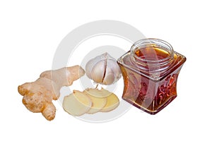 Honey , ginger and garlic on white background