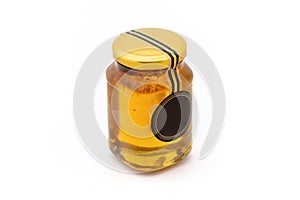 Honey in Glass Jar Isolated on White Background