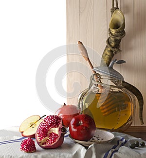 Honey jar with apples and pomegranate Rosh Hashana hebrew holiday photo