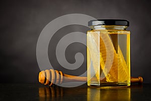 Honey Jar with Comb and Copy Space