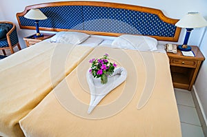 Honey moon bed with towel heart shaped on bed