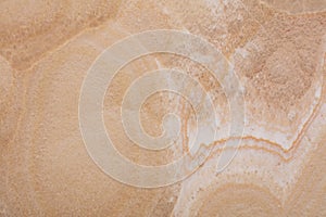 Honey Onyx texture, background in beige tone for stylish home interior.