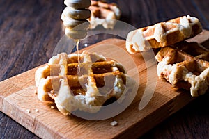 Honey Pouring on Belgium Waffles.