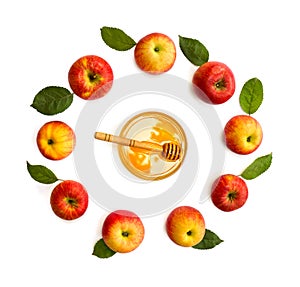 Honey and ripe yellow-red juicy apples with leaves apple tree on white background. Top view, flat lay