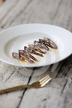 Honey Sesame Grasshoppers on a white plate