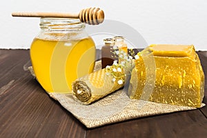 Honey still life with liquid honey and beeswax