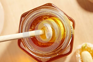 Honey with wood stick