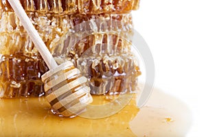 Honeycomb with honey and honey stick