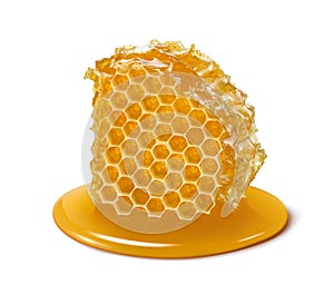 Honeycomb slice. Honey cell piece isolated on white background.