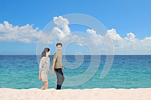 Honeymoon couple on the beach
