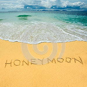 Honeymoon drawn in a sandy tropical beach