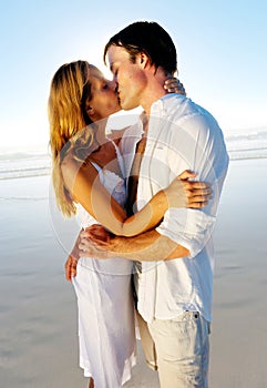 Honeymoon kiss on beach