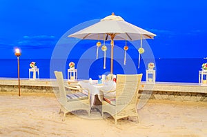 Honeymoon table set up dinner on the beach