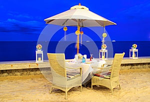 Honeymoon table set up dinner on the beach