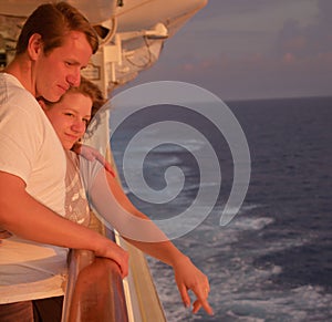 Honeymooners at Ships Rail at sunset enjoying wake