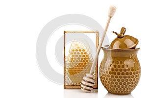 Honeypot and spoon for honey near honey combs