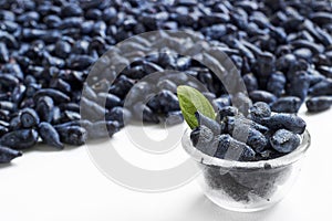 Honeysuckle blue berry fruits in a glass bowl