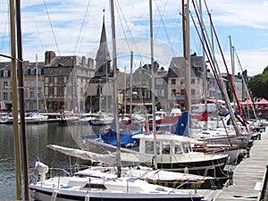 Honfleur, an ancient harbor with boats and yachts