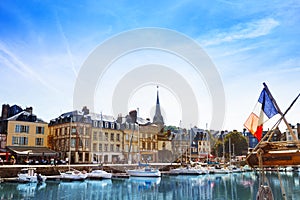 Honfleur harbor with sailboats at sunny day