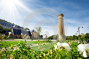 Honfleur streets with lighthouse at sunny day