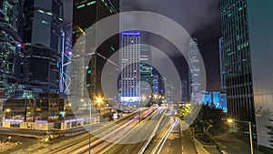 Hong Kong Business District with busy traffic timelapse at night.