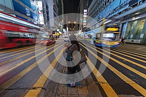 Night scenery of pedestrian crossing of busy street in Mongkok district in Hong Kong city