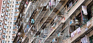 Hong Kong, China. Low angle view of crowded residential towers in Quarry Bay, Hong Kong. Scenery of overcrowded narrow apartments