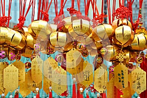 HONG KONG, CHINA - MARCH 13 2018: Holy bell on wall for respect praying at Wong Tai Sin Temple at Kowloon island