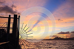 Hong Kong city victoria harbor sun set: beautiful sunset with Anticrepuscular rays