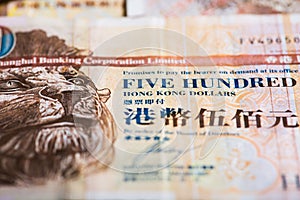Hong Kong Dollar banknotes as money background.