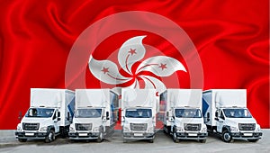 Hong Kong flag in the background. Five new white trucks are parked in the parking lot. Truck, transport, freight transport.