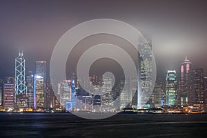 Night skyline centered around Bank of China tower, Hong Kong Island, China