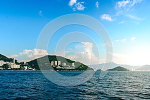 Hong Kong island hills with clouds and blue sky travel concept