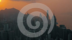 HONG KONG - MAY 2018: Aerial view of a sunset over Victoria Peak, Victoria Harbour, Hong Kong downtown.