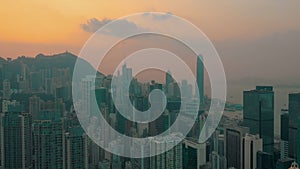 HONG KONG - MAY 2018: Aerial view of a sunset over Victoria Peak, Victoria Harbour, Hong Kong downtown.