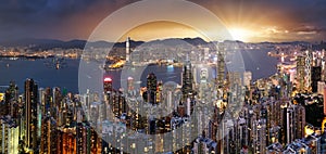 Hong Kong skyline panorama at dramatic sunset, China - Asia