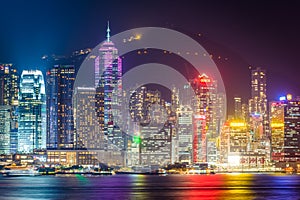 The Hong Kong skyline and Victoria Peak at night, seen from Tsim