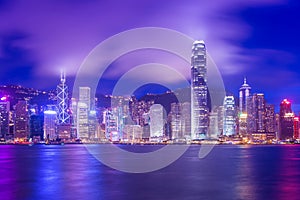 Hong Kong Victoria Harbour cityscape at night.