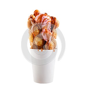 Hong Kong waffles with strawberry ice cream in paper cup