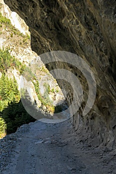 Hongde - A pathway under the steep rock