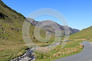 Honister Pass road and Gatesgarthdale Beck Cumbria.
