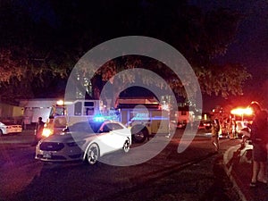 Honolulu Police Department police car and Fire Trucks lights flash on College Campus at night