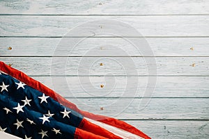 In honor of Veterans Day, American flags against a wooden backdrop